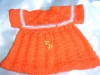 Puppenkleid orange (Gr.48-50)